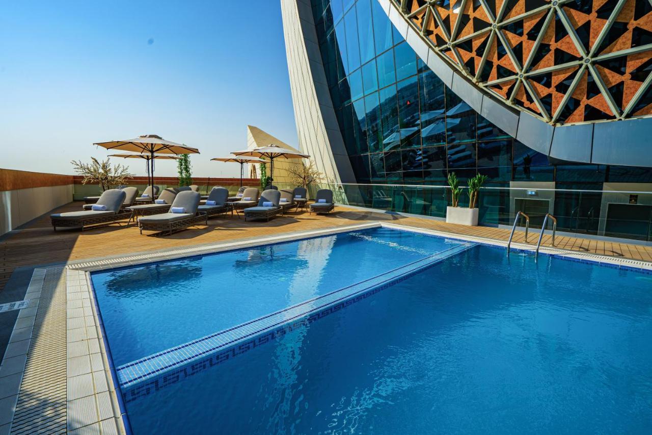Velero Hotel Doha Lusail 外观 照片 The swimming pool at the hotel